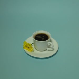 High angle view of coffee cup on table