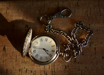 Pocket watch on table