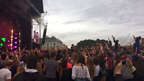 People enjoying at concert