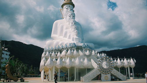 Low angle view of statue against sky