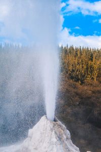 View of water emitting from geyser