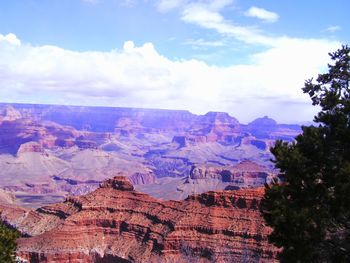 High angle view of mountain range against cloudy sky