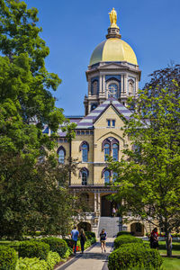 University of notre dame against clear blue sky in city