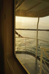 Scenic view of sea seen through window