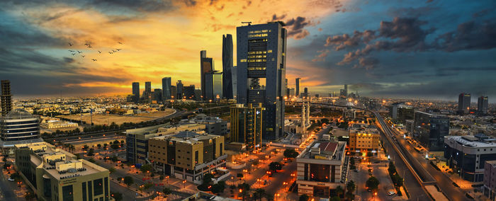 High angle view of city buildings during sunset