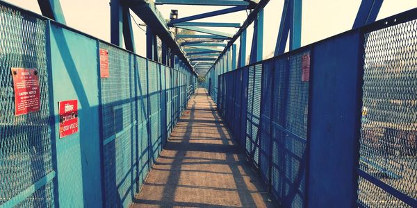 Walkway against sky