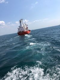 Ship in sea against sky