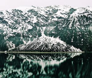 Scenic view of snowcapped mountains during winter