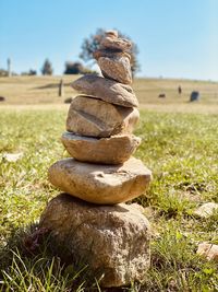 Stack of stones on field