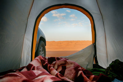 Desert seen through tent