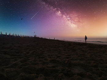 Scenic view of sea against sky at night