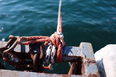 High angle view of rope tied on boat