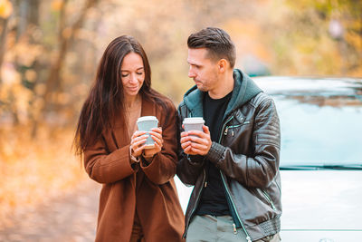 Portrait of young man using mobile phone