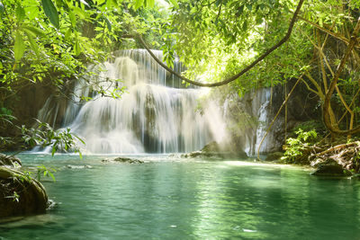 Beautiful scenic of the waterfall background of huaymaekamin waterfall in kanchanaburi, thailand.