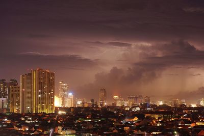 Illuminated cityscape at night