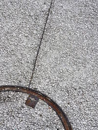 High angle view of bicycle on footpath