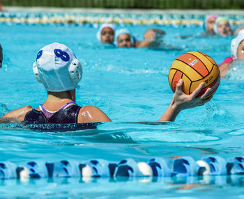 People swimming in pool