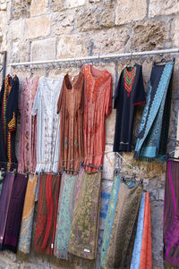 Clothes drying against wall