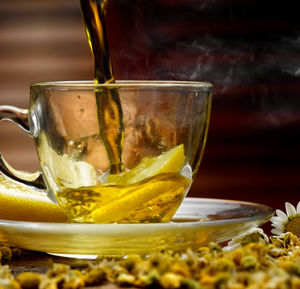 Close-up of tea in glass on table