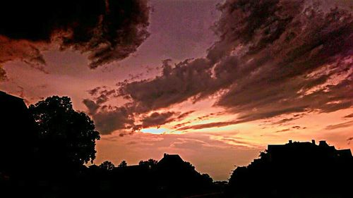 Silhouette of buildings at sunset