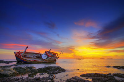 Scenic view of sea against sky during sunset