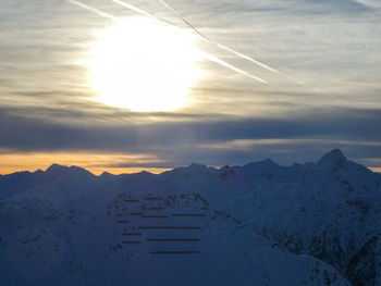 Afternoon sun in snowcapped austrian mountains