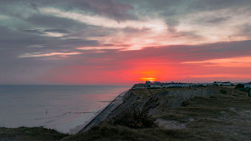 Scenic view of sea against sky during sunset