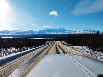 Empty road against sky