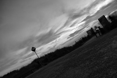 Road against cloudy sky