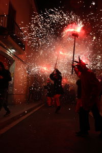 Correfoc parties, typical with firecrackers and lights in the towns