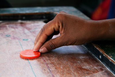 Detail shot of playing carom board