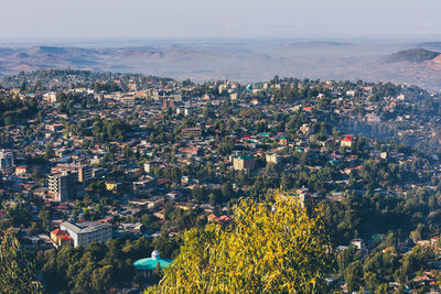 High angle view of townscape against sky in city