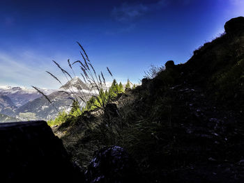 Close-up of rock against sky