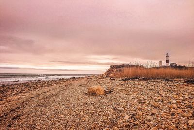 Scenic view of sea against cloudy sky