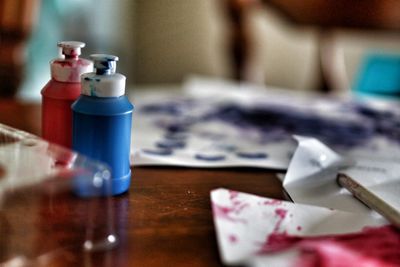Close-up of wine glasses on table