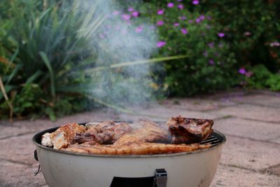 Close-up of meat on barbecue grill