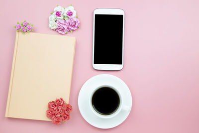 Directly above shot of coffee cup on table