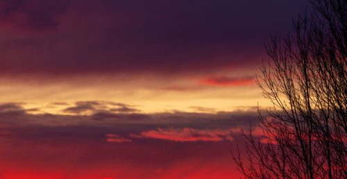 Low angle view of dramatic sky during sunset