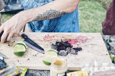 High angle view of man preparing food