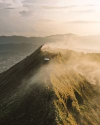 Scenic view of landscape against sky during sunset