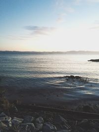 Scenic view of sea at sunset