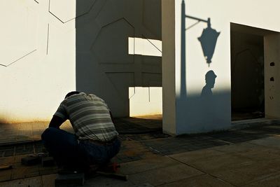 Woman standing in front of building