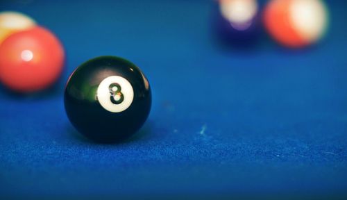 Close-up of pool balls on table