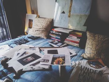 High angle view of books on bed