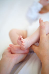 Cropped image of woman holding baby