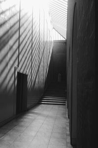 Empty alley amidst buildings