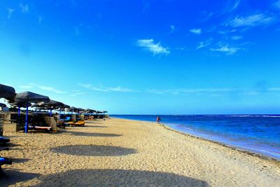 Idyllic view of beach against sky