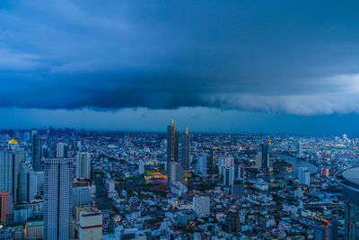 Aerial view of cityscape against sky