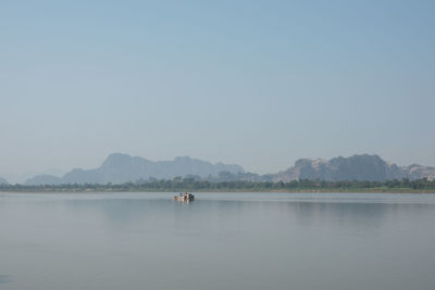 Scenic view of lake against clear sky