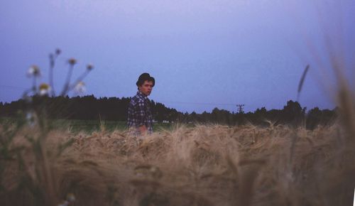 Woman standing on field